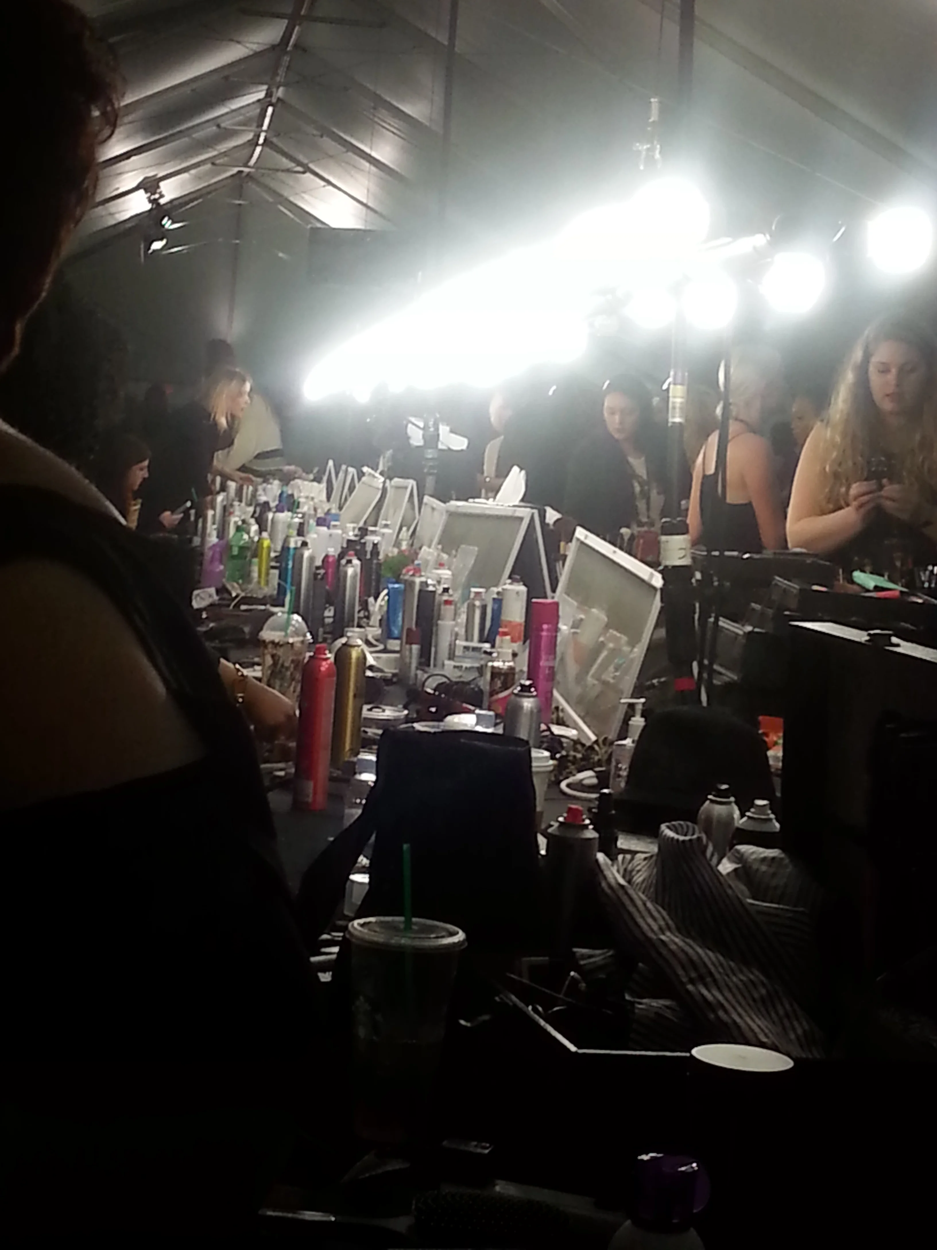 bridal beauty business coach Jasmine Jones Havenstrite working backstage at fashion week