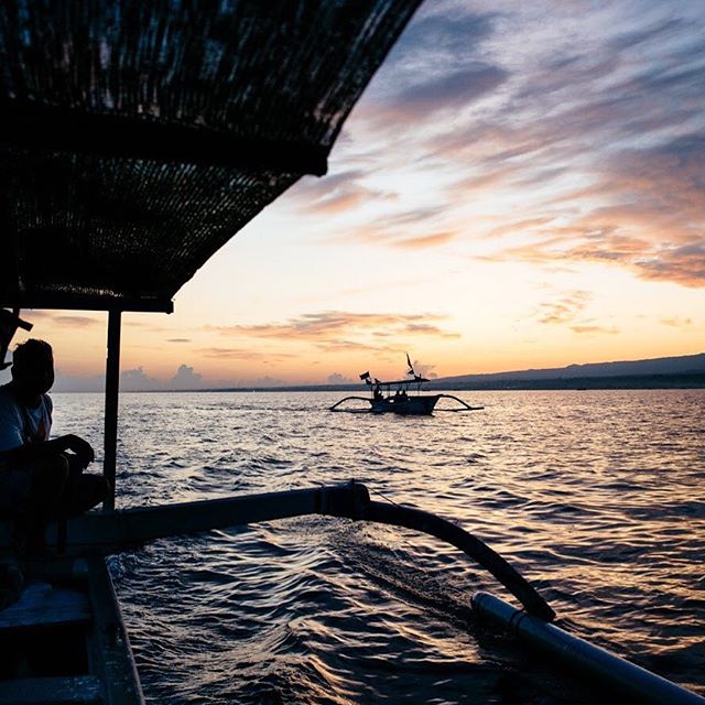 Heading out with fishing boats and waiting to catch up the dolphins during their morning workout routine. Even with that low light and difficult conditions the Tamron 24-70 still wins.

#dolphins #travel #travelphotography #bali #lovina #welcometothe