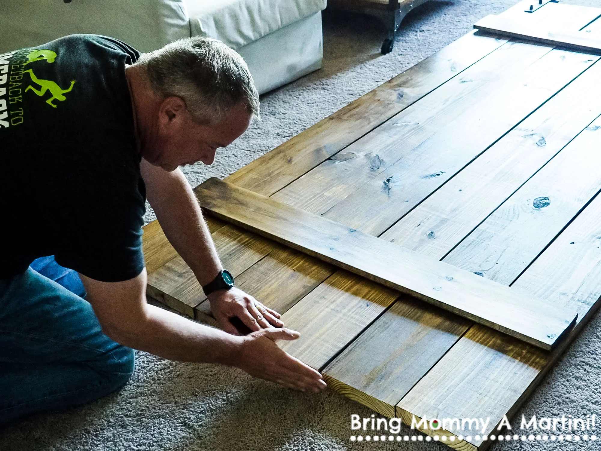 Mark did a great job cutting the boards to the right length, but there was a tiny hair of a difference in length once they were lined up next to each other. We wanted to bottom edges to line up exactly because that's where your eye goes. Any edges t…