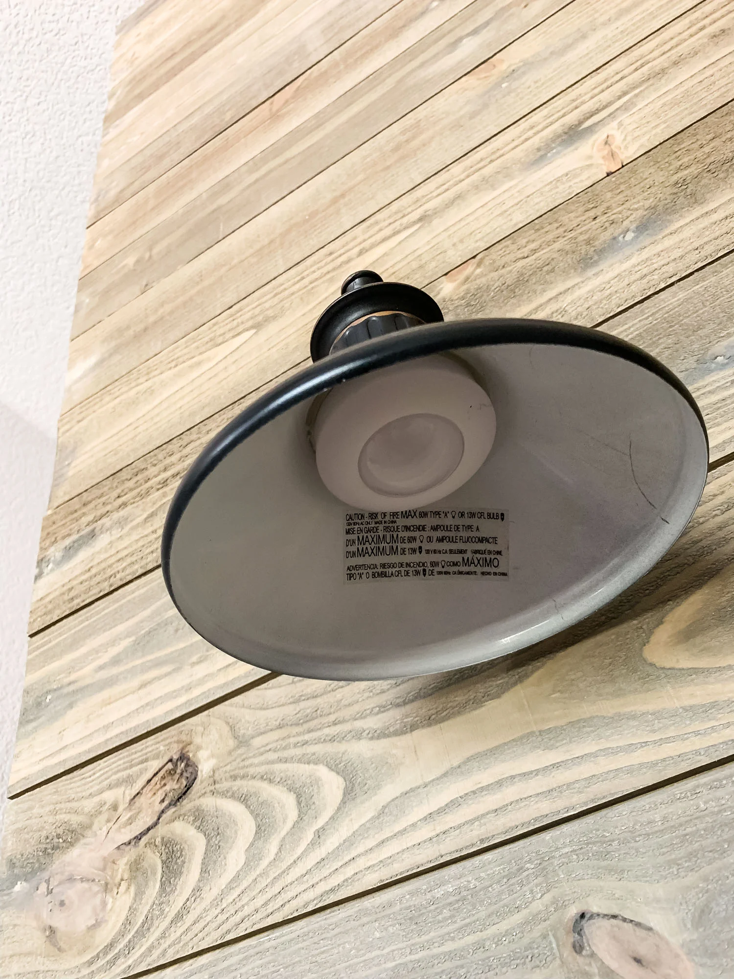 This is what it looks like after the puck light is screwed onto the base that you created inside the lamp