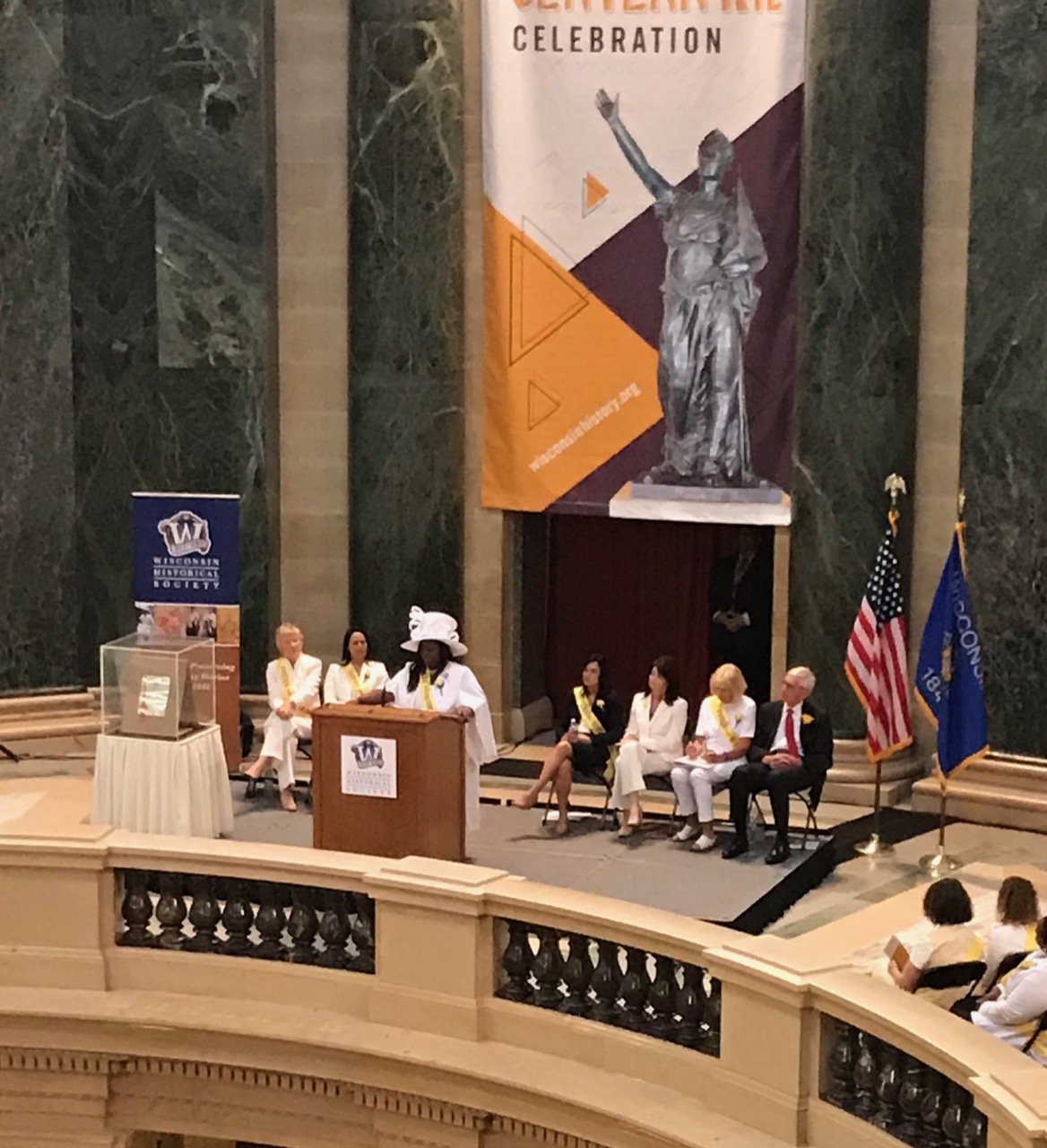 Shelia Stubbs, Dane County Supervisor and Assembly Representative addresses the fraught history of woman suffrage and black suffrage, reminding us that black women may have earned the right to vote in 1920, but laws in many states made it impossible for many black women (and men) to exercise that right until the Voting Rights Act in 1964. And voter suppression laws remain in place in Wisconsin and around the nation.