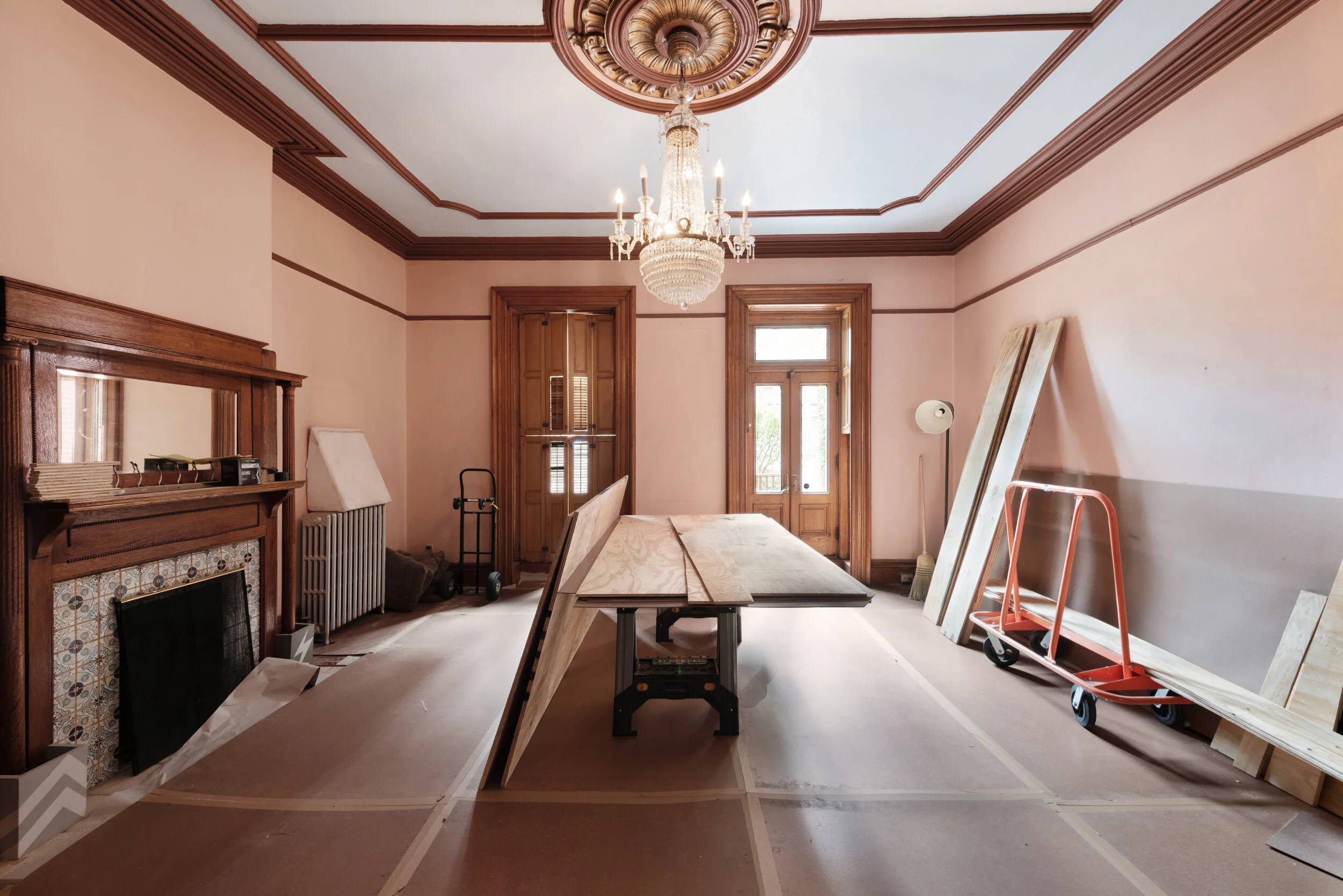 Natural light streams through the parlor as the home is prepped for renovations.