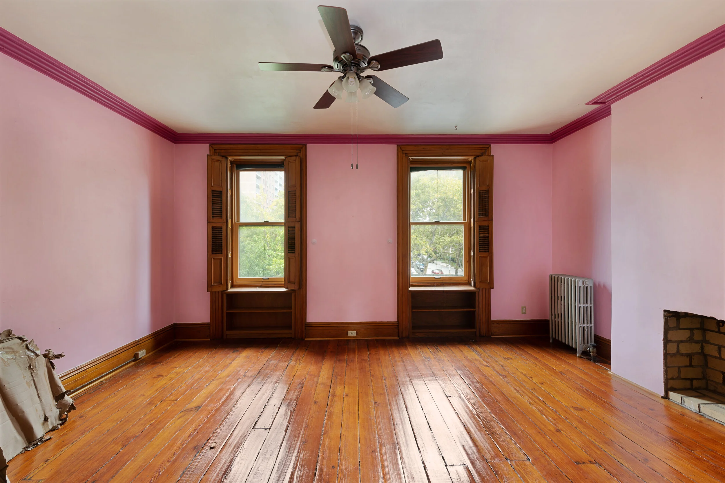 One of the four bedrooms in the home, pre-renovation.