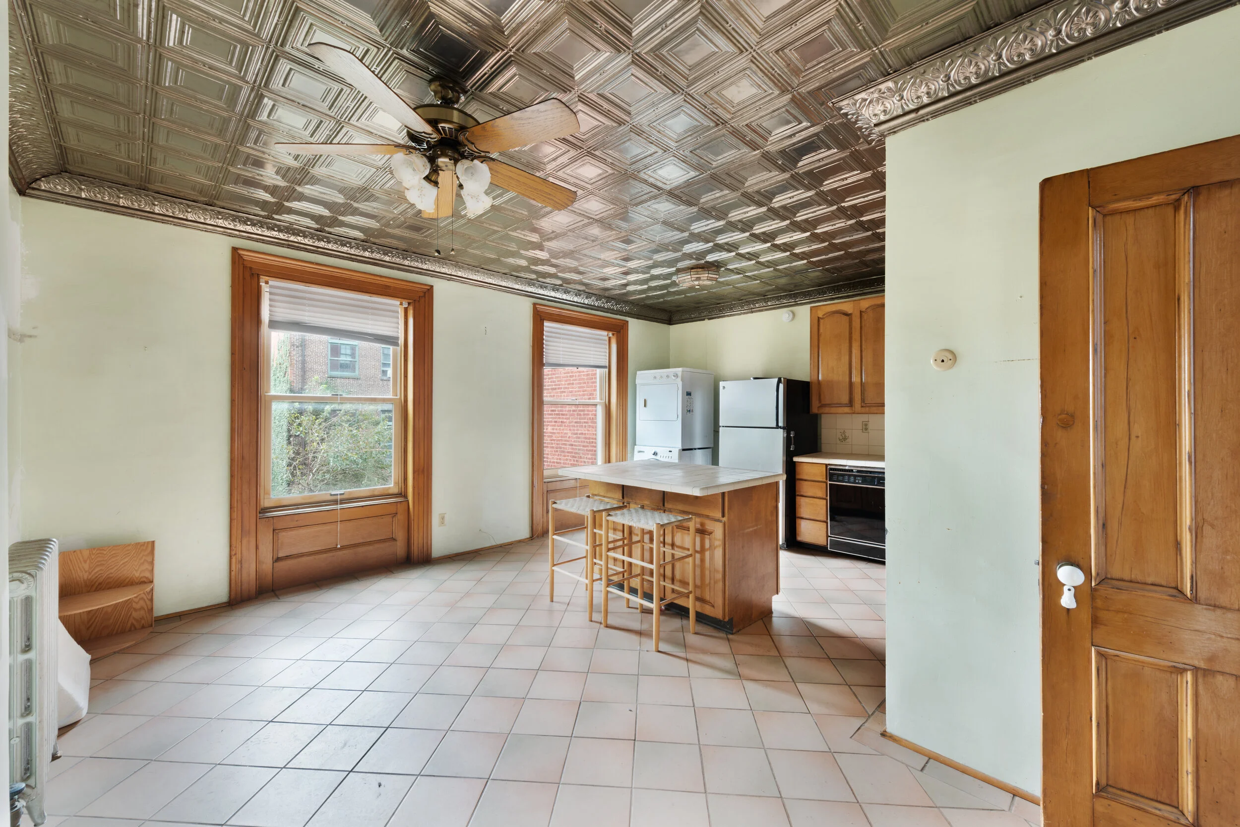 The home features generous room proportions, including the large kitchen.