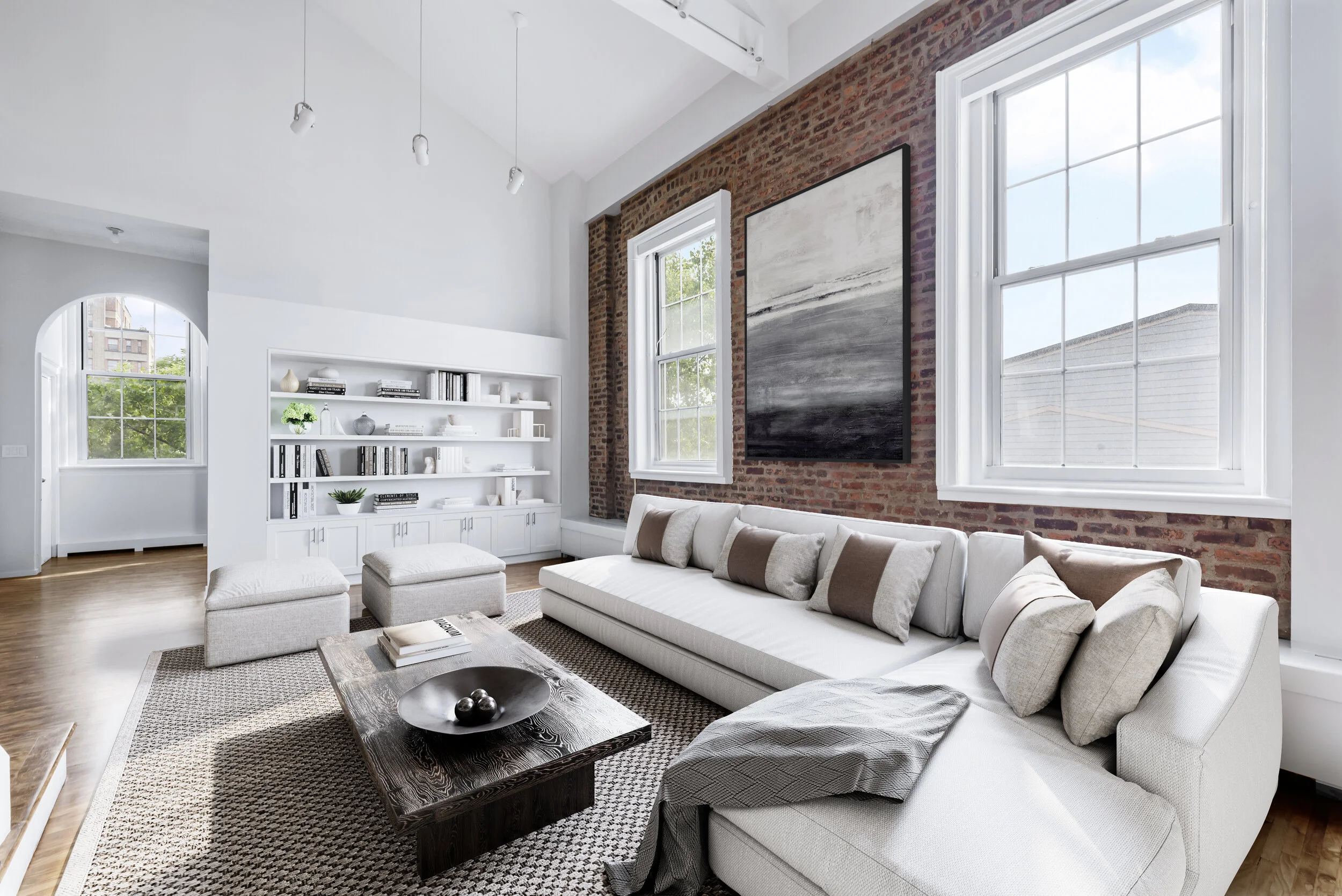 HVAC was installed in order to leave the 7-ft sash windows unobstructed, and custom built-ins were added in the living areas to create additional storage and display space.