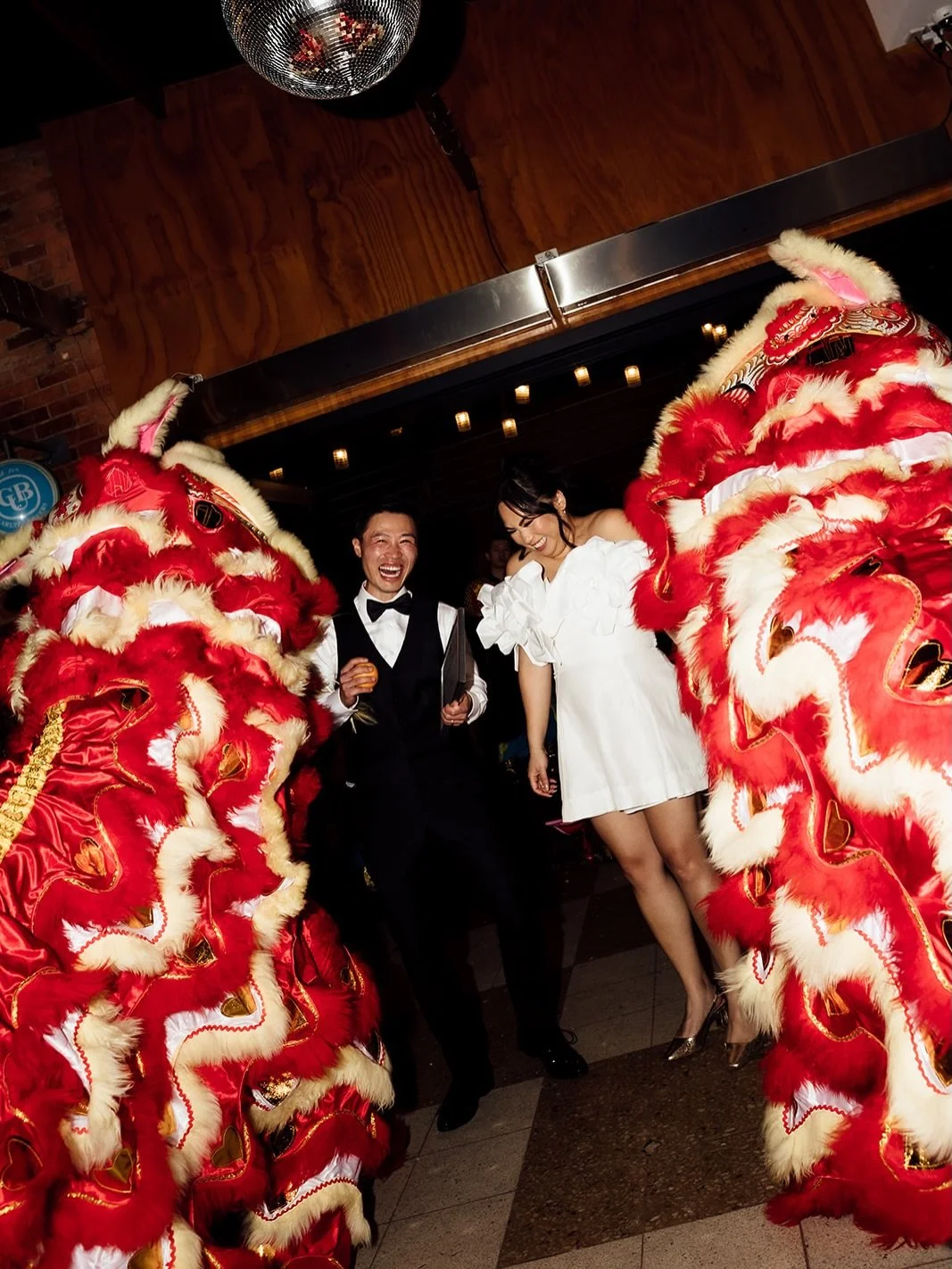 We can still hear the drums from the incredible Lion Dancers at Chloe &amp; Brian's wedding. 

WEDDING TEAM: 
Photographer: @lizbarnesphoto 
Cake: @pinto.tiramisu
DJ: @jonbling
Florist: @babylonflowers
Photo booth: @showtimefotobooth 
Dancers: @dbqal