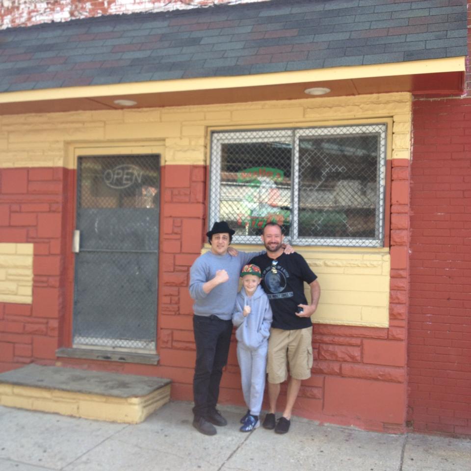  Al and his son from Middlesborough, United Kingdom where Rocky 5 was filmed as Rocky looks up at Mighty Mick's poster on the gym.&nbsp; 