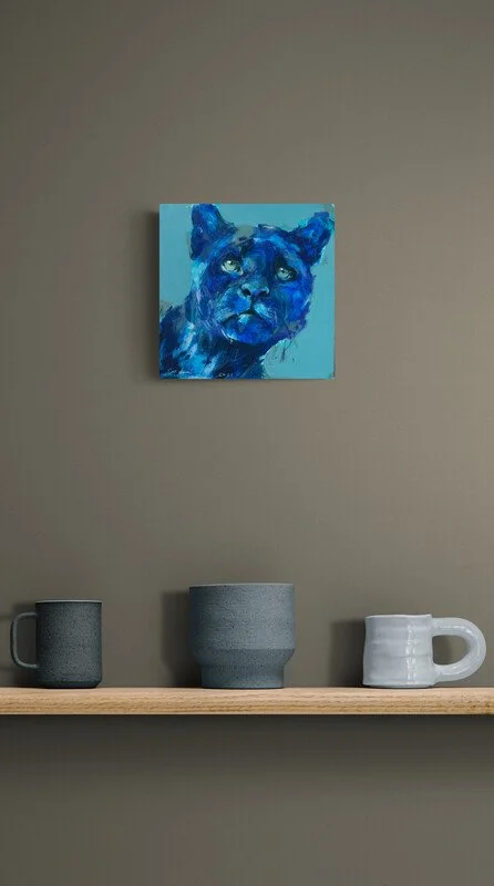 ceramic-mugs-on-a-wooden-shelf.jpg