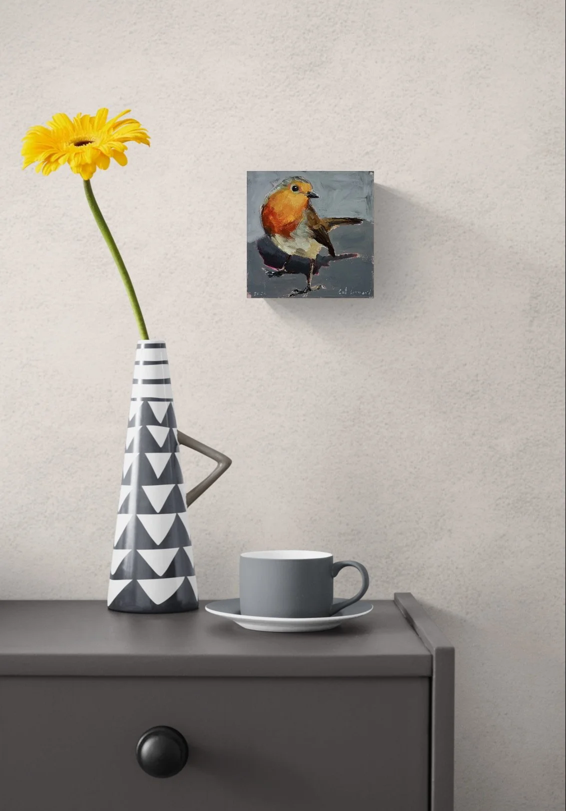 Close-up of a flower and vase on a cabinet.jpeg