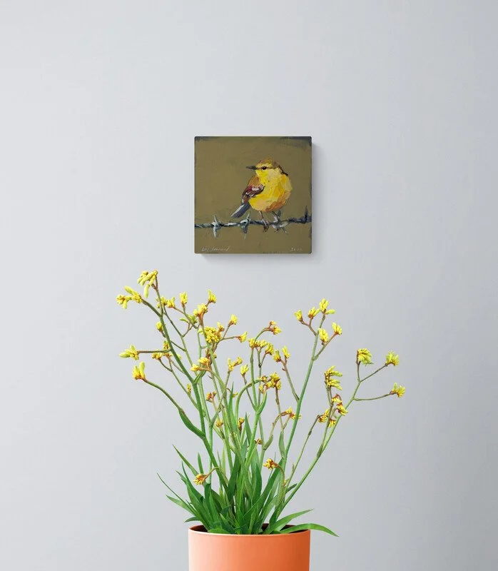 potted-plant-with-yellow-buds-sitting-on-a-stool.jpg