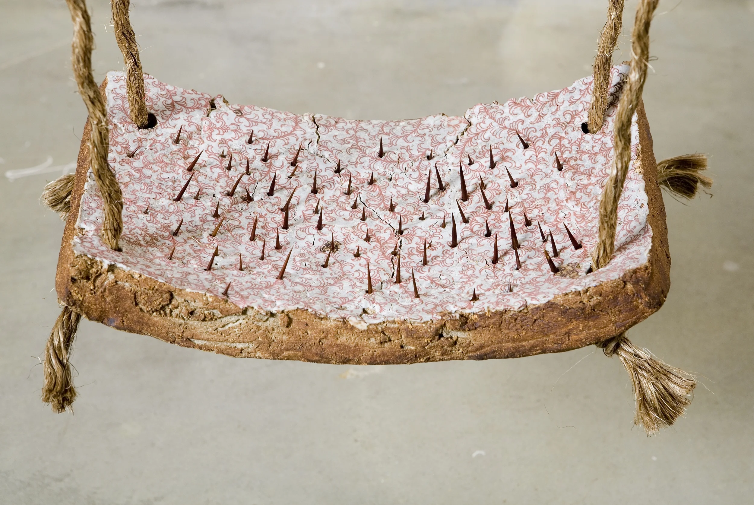 DANGEROUS PLAYGROUND, detail ceramic, thorns, rope
