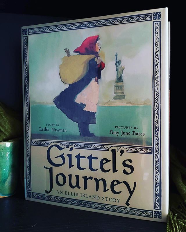 Gittel had already been prepared to leave her belongings, her best friend Raisa and her goat Frieda behind, that—at 9 years of age—she’d have to sail to America without her mother was unexpected. It isn’t safe to stay until Mama can pass the medical evaluation—and we can conclude why.
Amy June Bates work is always stunning. The woodblock stamped frames and title page illustrations are gorgeous. Bates literally frames the text with a sense of the historic and cultural. The portraiture in Gittel’s Journey is remarkably effective in translating the feeling of something past while experiencing all the emotion in the present. Families shouldn’t have to flee, be separated, or be kept so vulnerable when they do and are.
I love Gittel’s invitation at the close. Her journey was incomplete without Mama and those tall white candles. And it is now her turn to call her mother home and to the lighting of the candles.
Gittel’s Journey is a treasure in text and illustration; two masterful portrait artists capturing a time so presently felt.
#gittelsjourney #amyjunebates #lesleanewman @abramsbooks 2019. full #bookreview link in profile. #leslied #picturebooks #historicalfiction #childrensbooks #jewishamericanheritagemonth