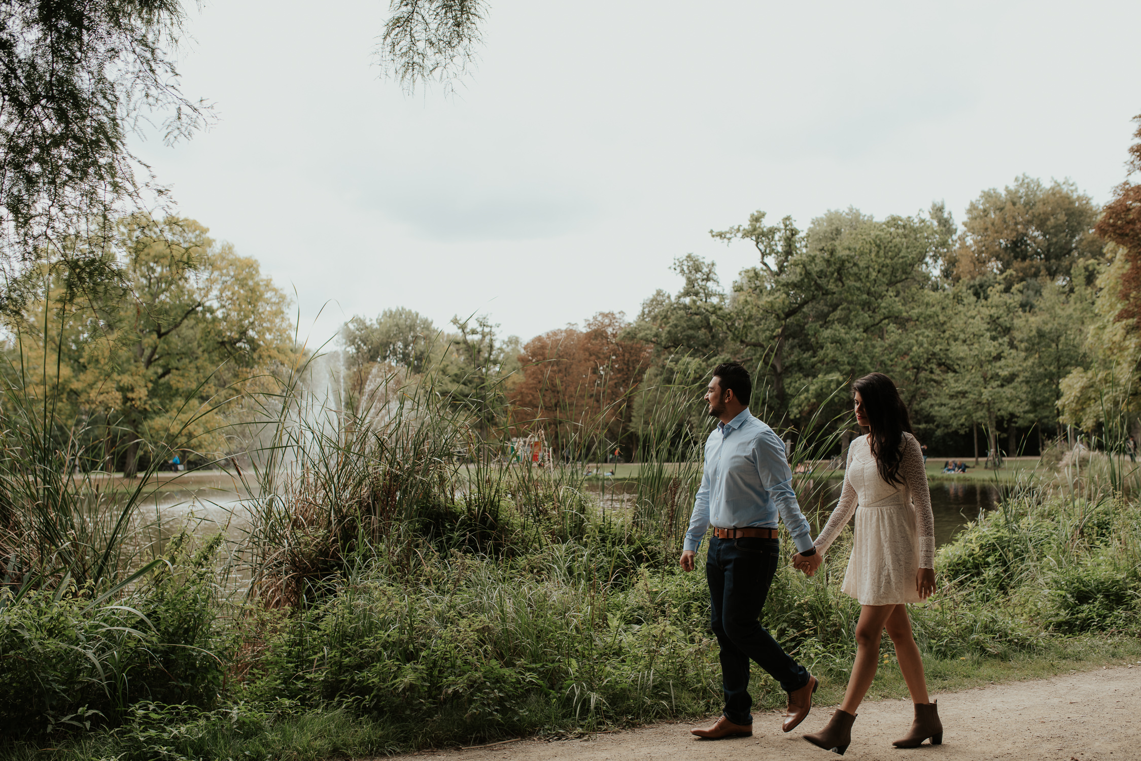 loveshoot bruidsfotografie amsterdam couple walking in vondelpark by mark hadden