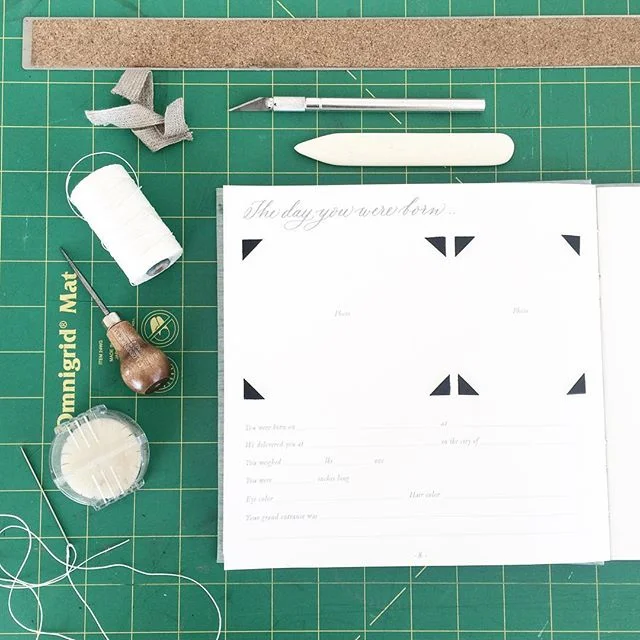 Dusting off the old book binding gear to make these baby books for some sweet new boys who just came in the world. #calligraphy #handmade #bookbinding #bookdesign #babybook 