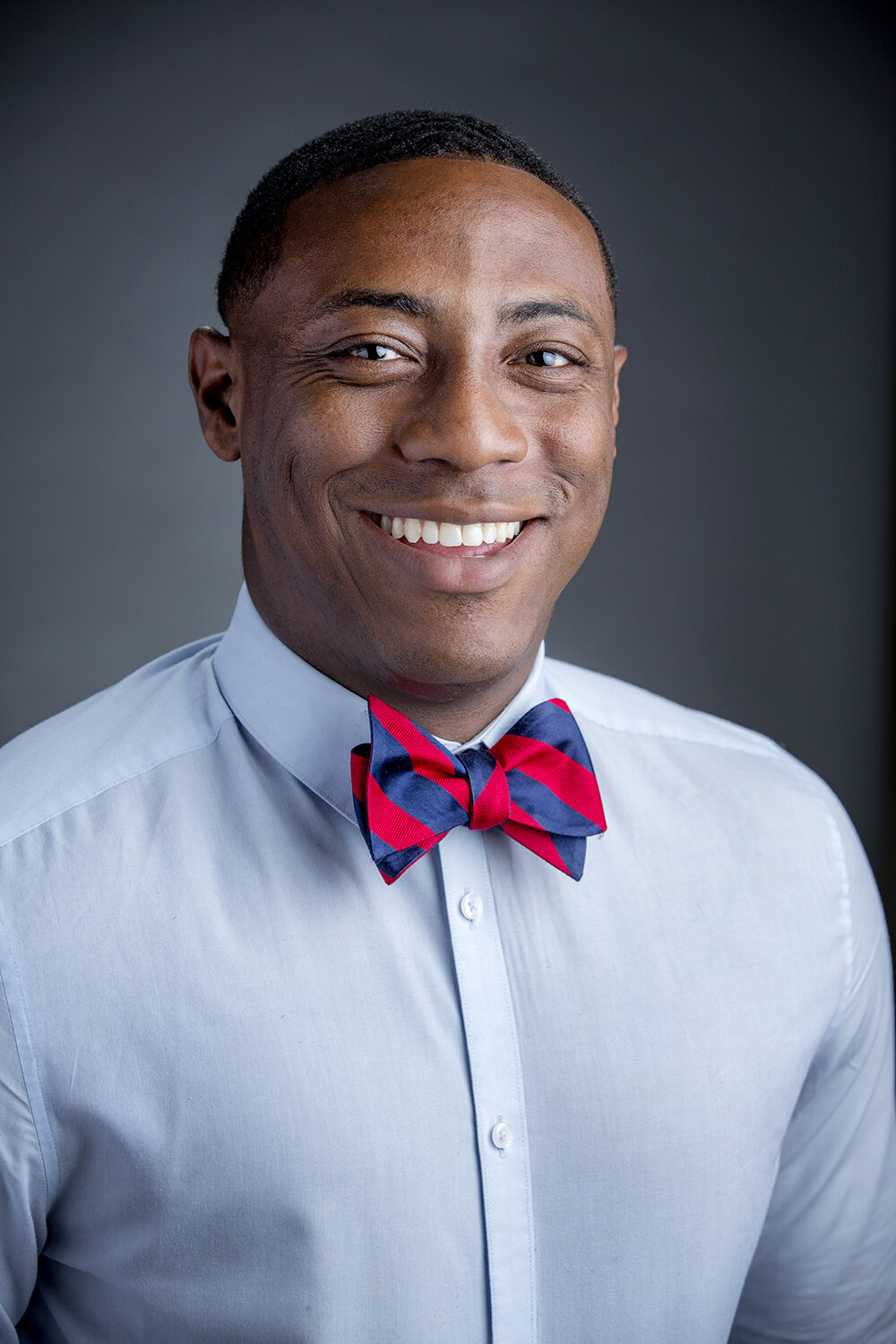 african american male headshot on grey.JPG