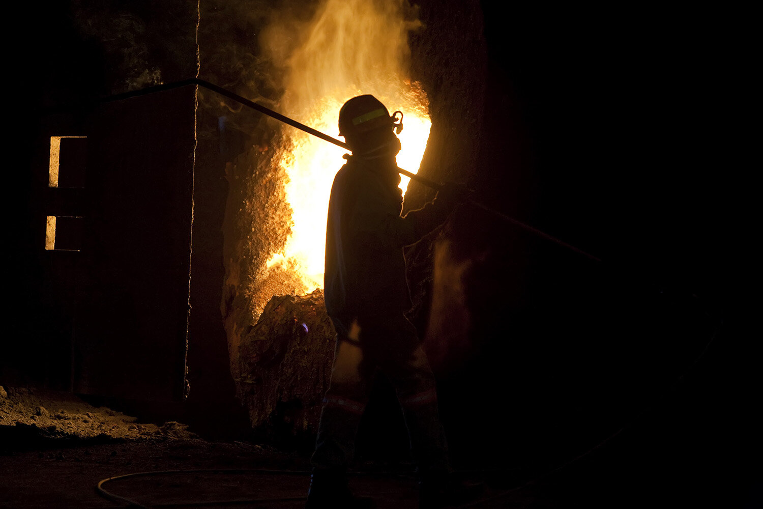 industry manufacturing steel arc furnace with male.JPG