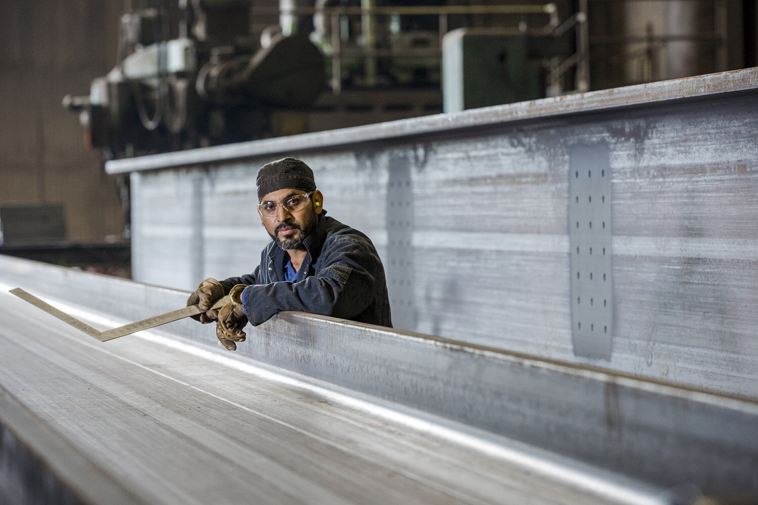 industry manufacturing steel welding hispanic male portrait.JPG