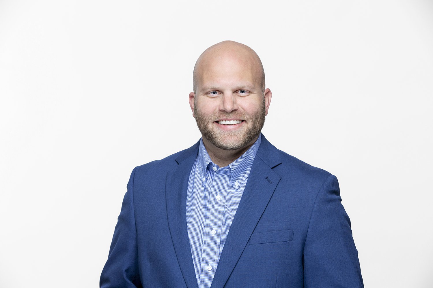 Josh Wilson white male executive headshot on white seamless.JPG