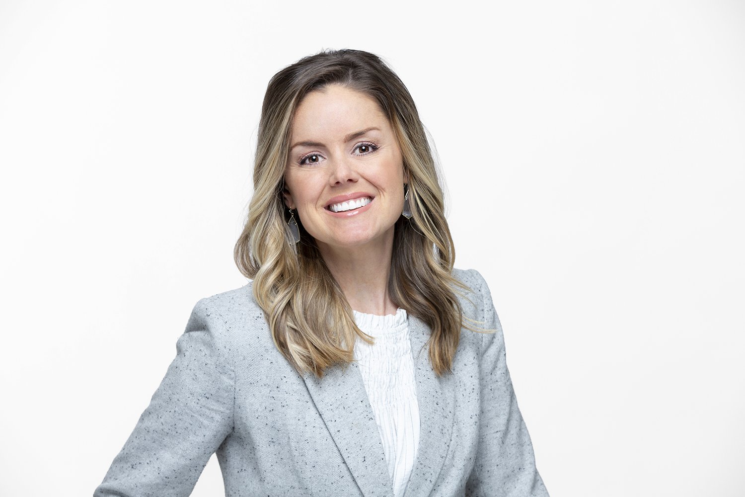 Kathryn Rogers white female executive headshot on white seamless.JPG