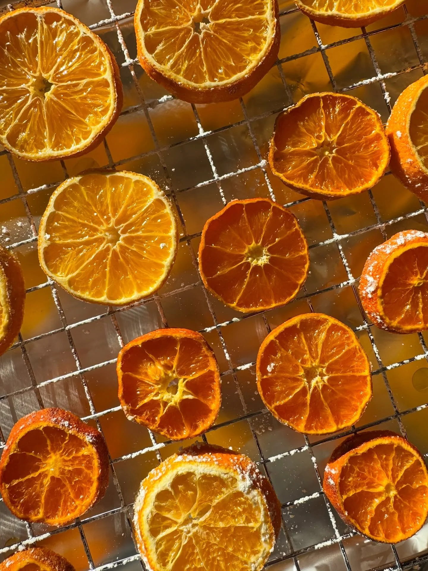 A new tradition! Dried oranges. 🍊

The fragrance filling the halls was 👌! Slice, generously sprinkle both sides with powdered sugar and bake on a baking rack for 3 hours at 170 degrees. Use for garland, ornaments and more.