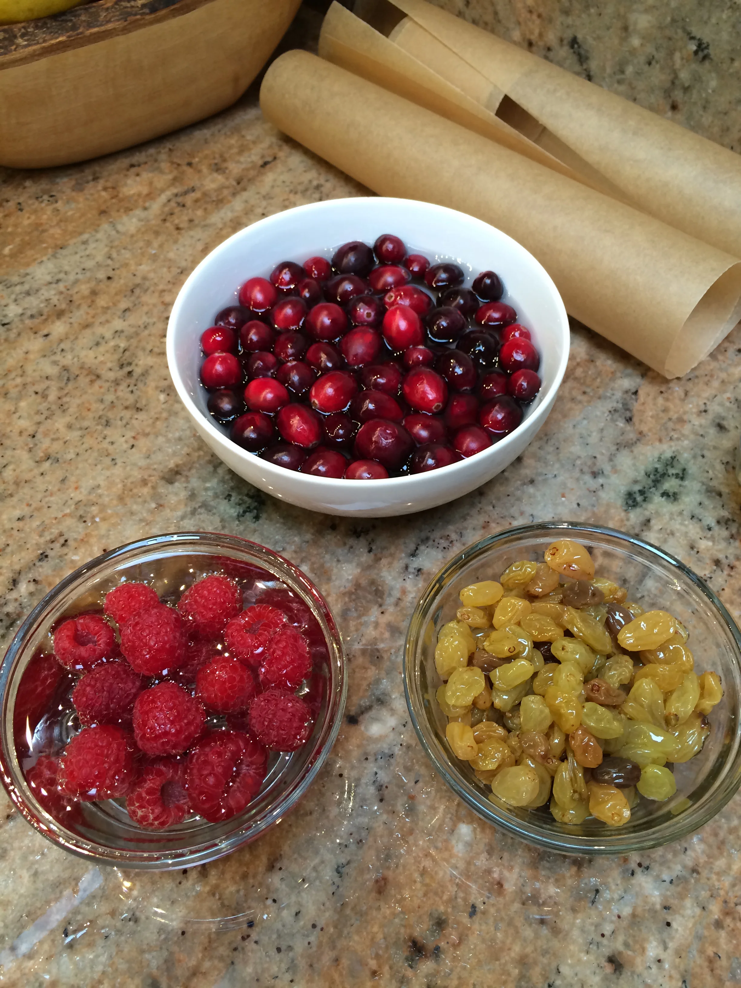 Well, I have some raspberries, cranberries and Malibu Rum-soaked golden raisins..let's make bundt cakes!
