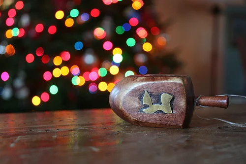 What does a Jewish-Christian family do in December -- when both Christmas and Hanukkah are celebrated? The answer can nurture children towards greater religious appreciation later in life. 