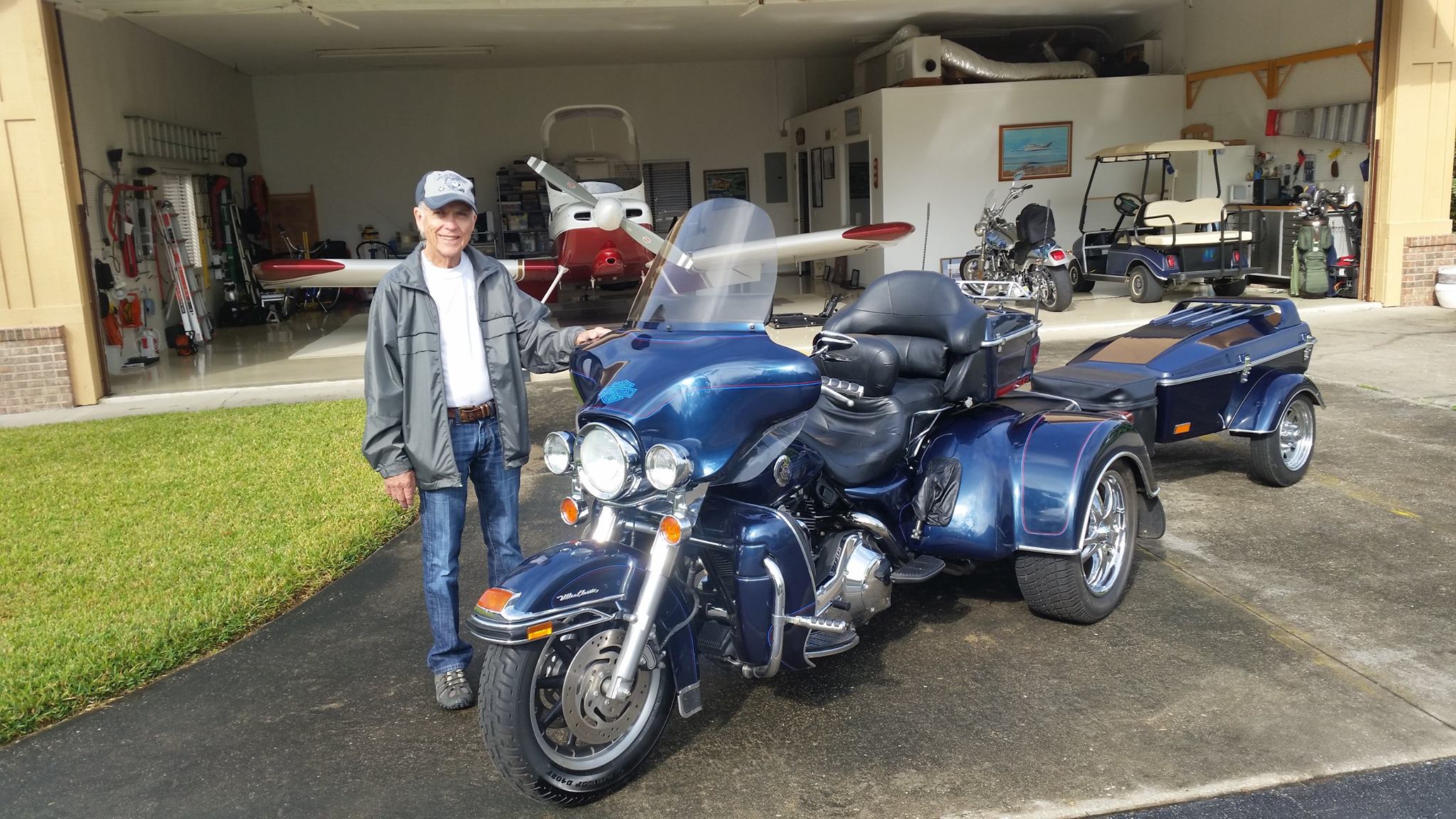 blue harley trike and trailer