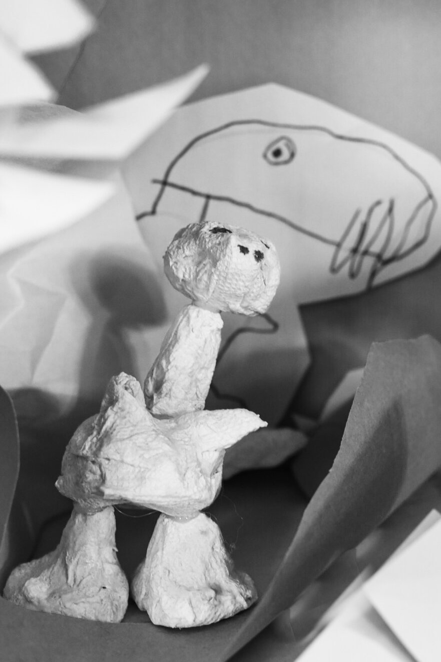 Stuffies go rock climbing, corn dog pizza + a cool T. Rex