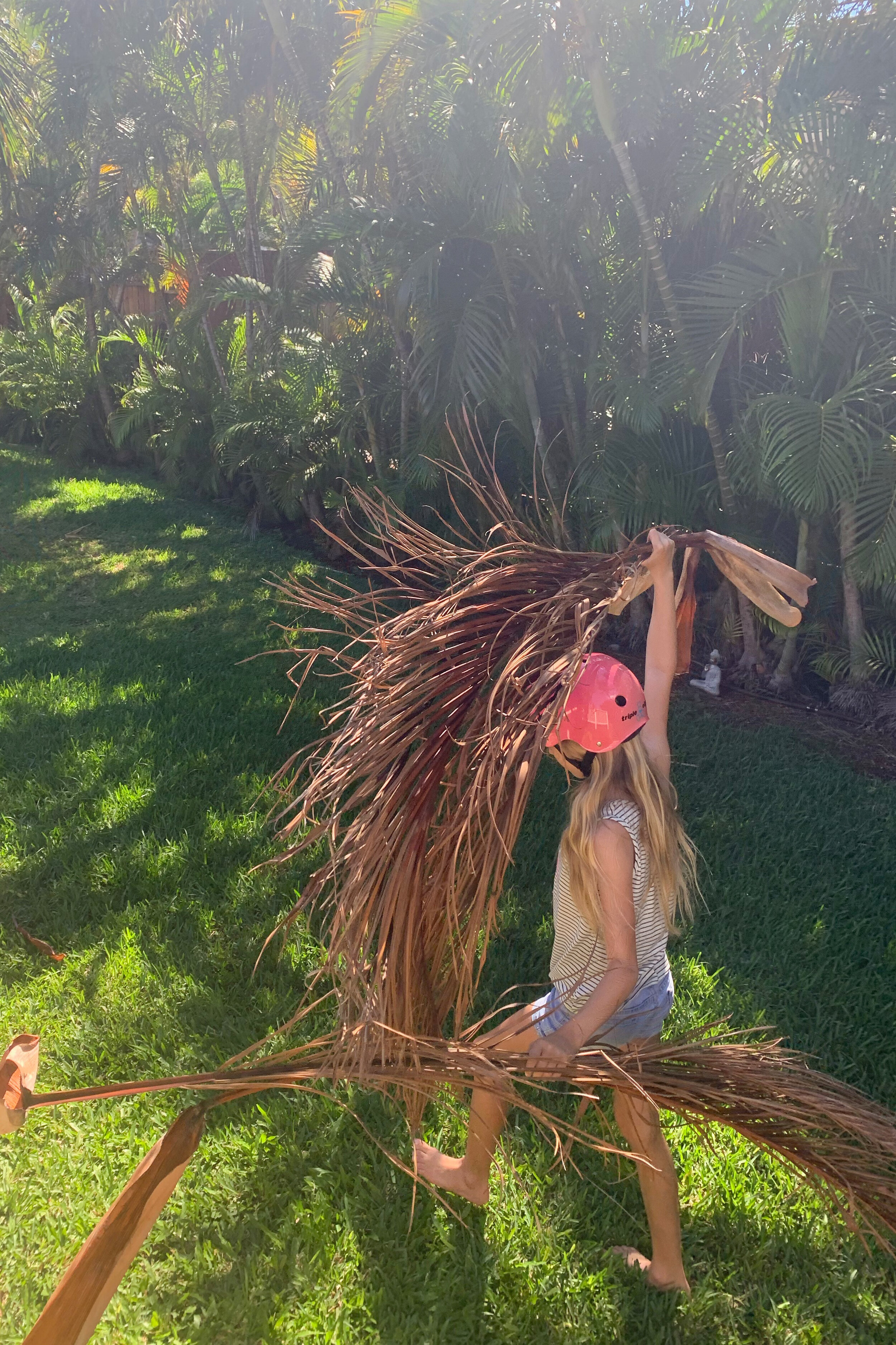 Rainbow and "to school" walks + Zo wears a bike helmet for yard work