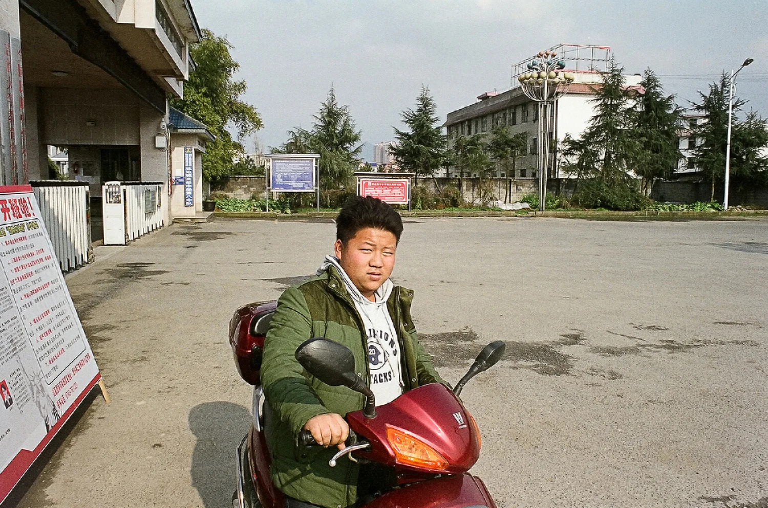 10th Grader on Scooter, Huayuan Town, Hunan, 2013