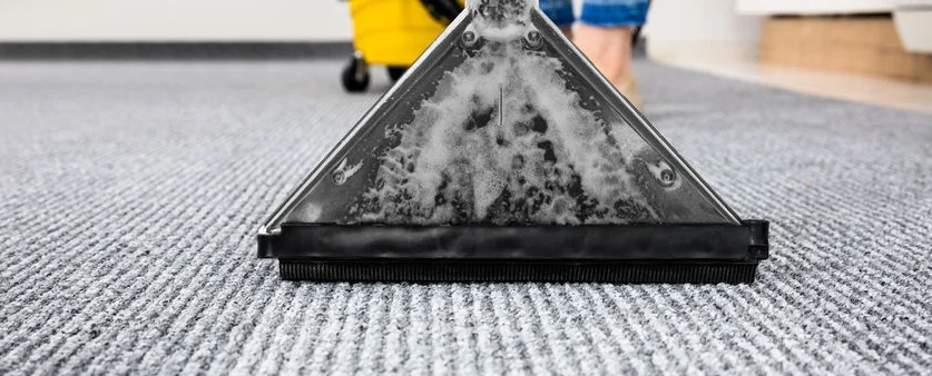  71451607 - close-up of a cleaning carpet with vacuum cleaner 