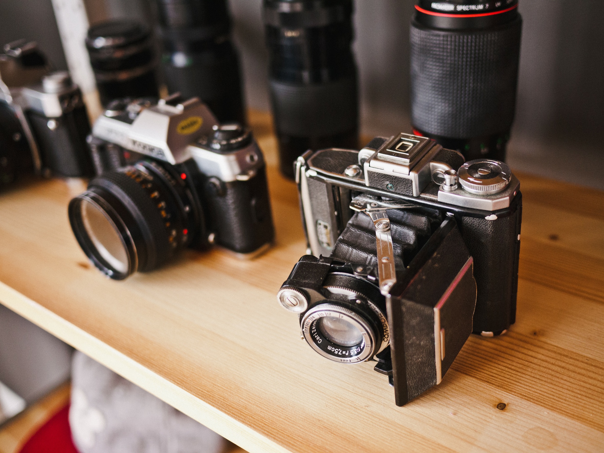 " Untitled vintage cameras " by Jeff Sheldon is licensed under CC0 1.0 and cropped from the original.