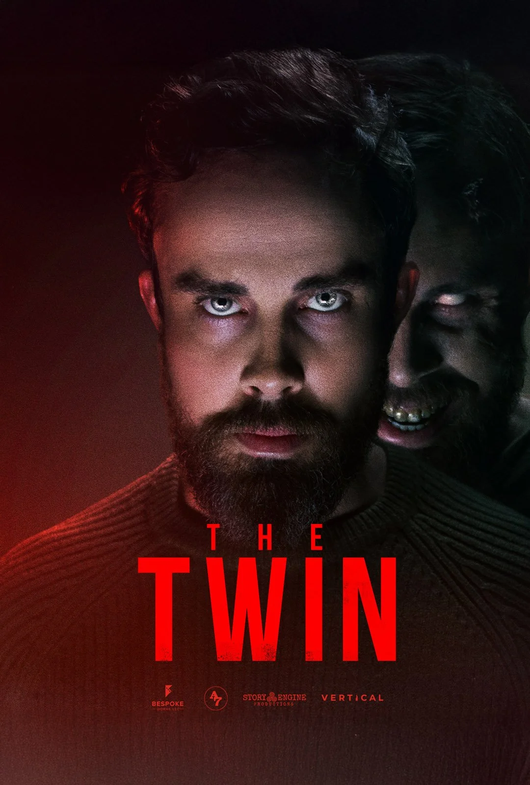 A dark promotional poster for 'The Twin' featuring two men with intense expressions, one with a beard and piercing eyes, and the other partially visible with a menacing expression. The title is in bold red letters at the bottom, along with logos of production companies.