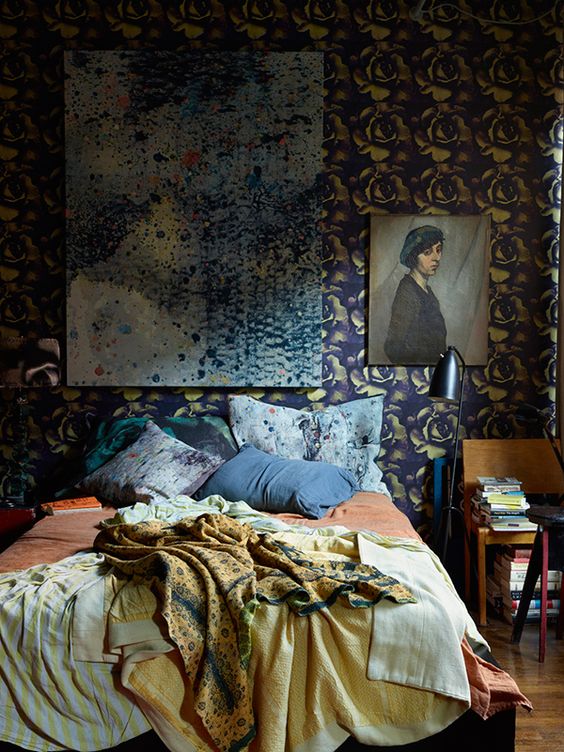 A bedroom in Martyn Thompson's loft, featuring his own wallpaper and pillowcases made from his fabric designs. Photo originally from a 2015 New York Magazine shoot.