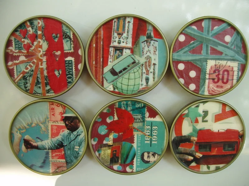 In 2006 and 2007, I recycled the lids of baby food jars by turning them into magnets. Each magnet featured an original collage. I sold them in sets of six in my etsy shop at the time. 