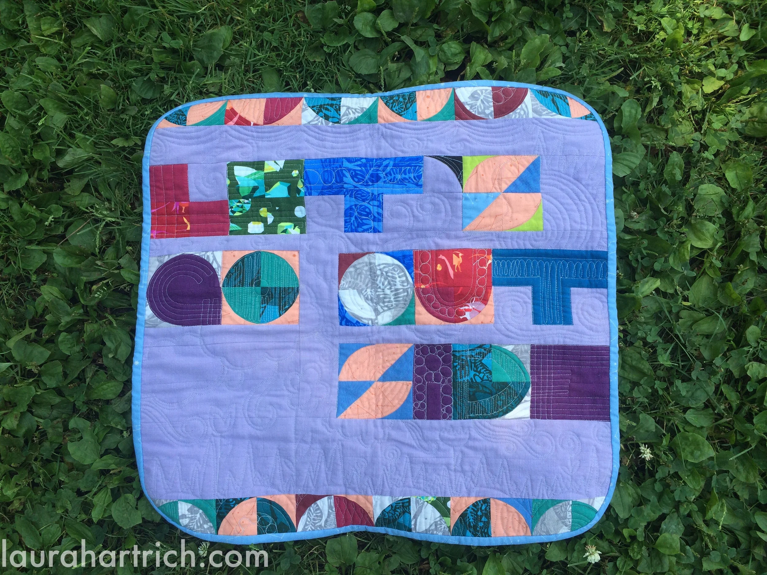 Mini quilt for Giedra, measuring about 24" square.