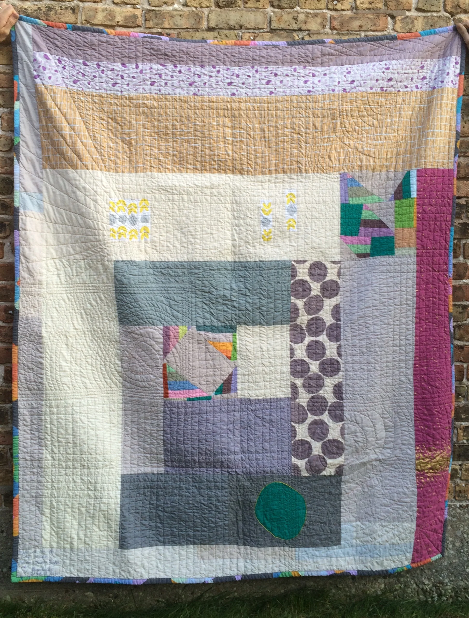 I did a huge log cabin block for the back of the quilt.