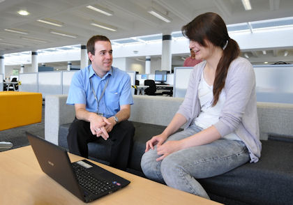Emma Gray talks to a colleague