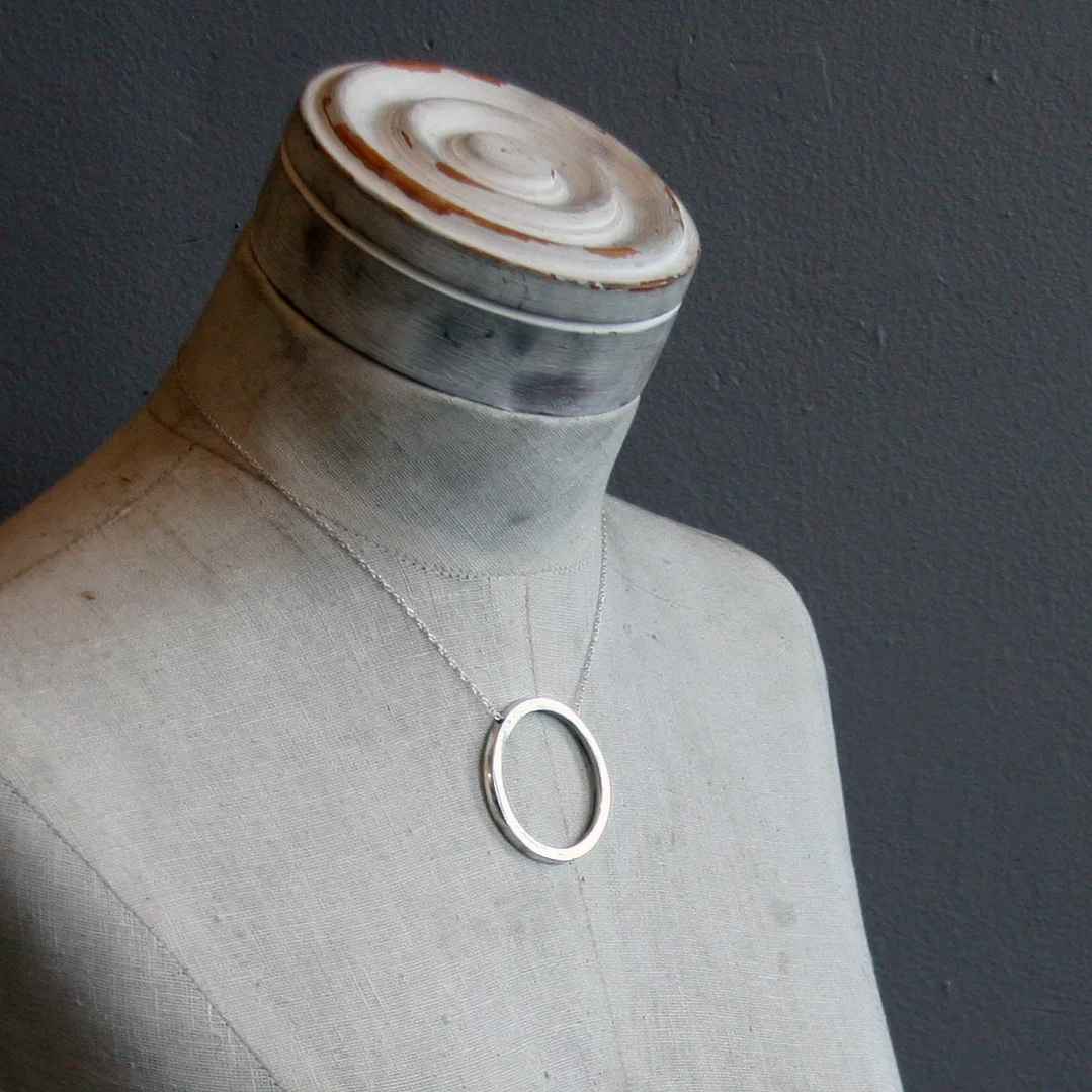 thick sterling circle neck.jpg