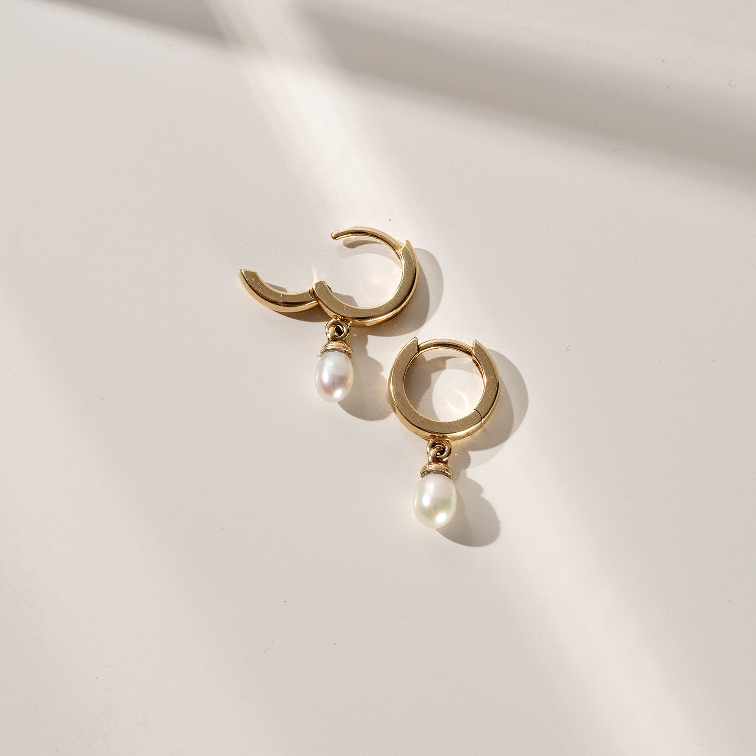 Gold pearl drop earrings