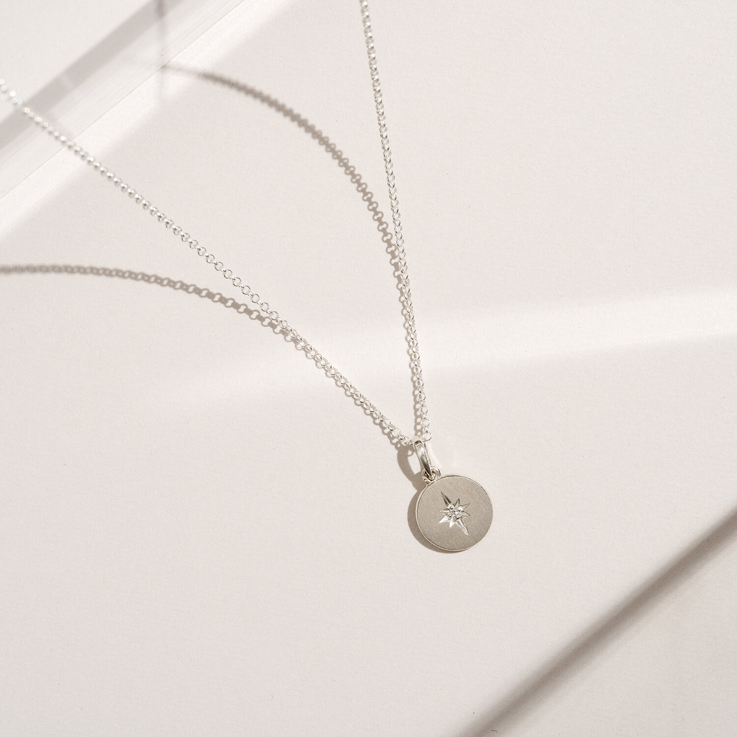 Sterling silver diamond star necklace