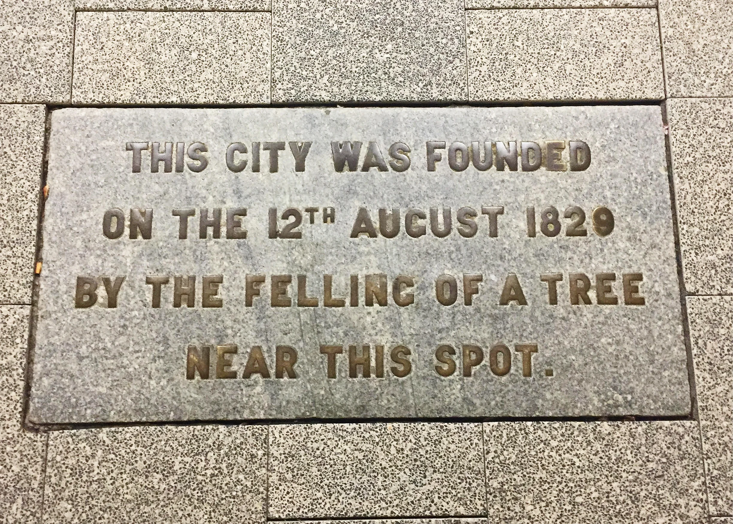 Celebratory plaque at the base of Perth Town Hall. 