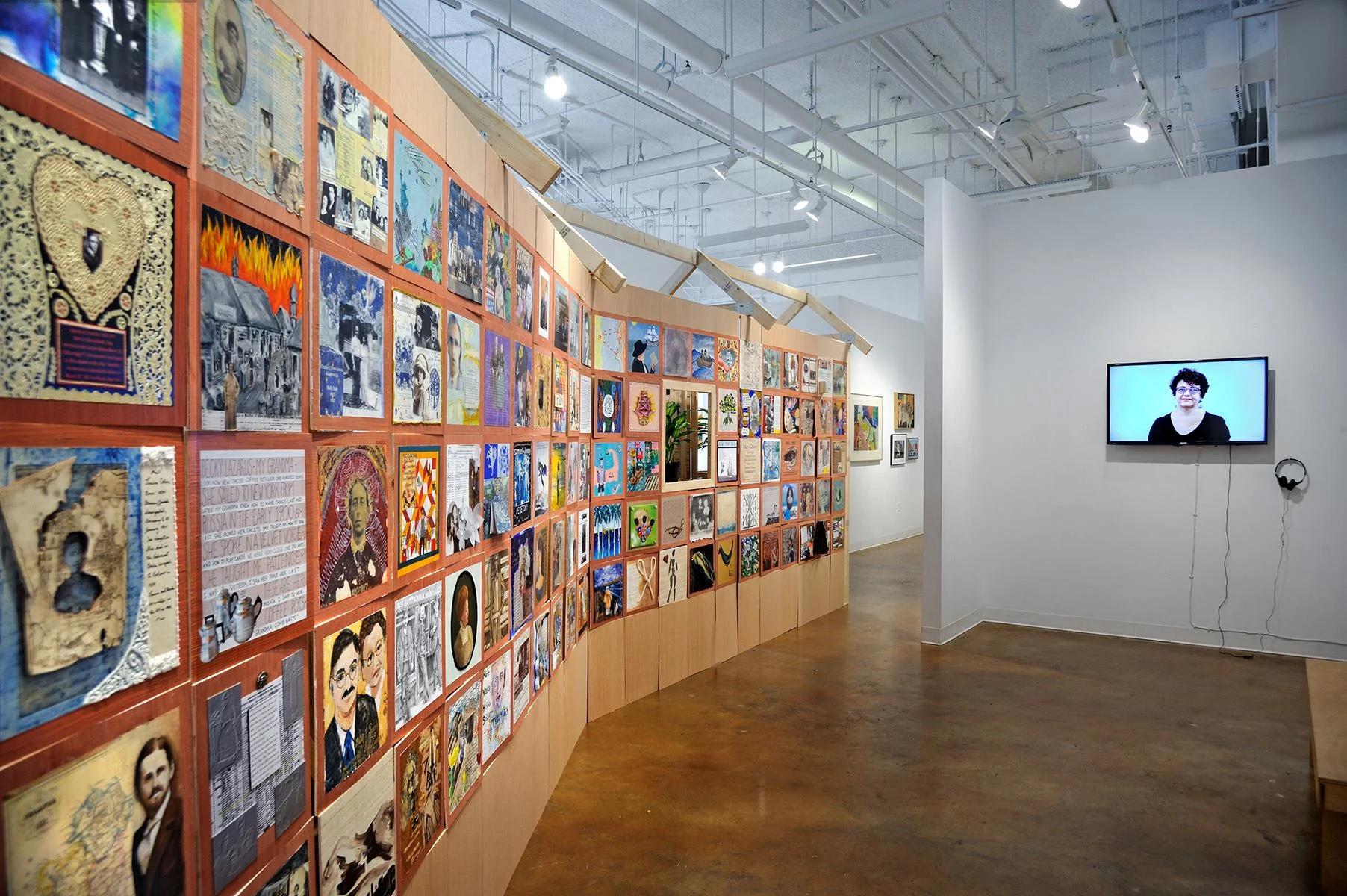 #1040 (Sculpture and Dance Performance): Tire fragment, corrugated metal roofing, chain link fencing, fragment of wire reinforced concrete, small metal objects, daughter. The installation is 8’ tall, 10’ wide and 3’ deep.