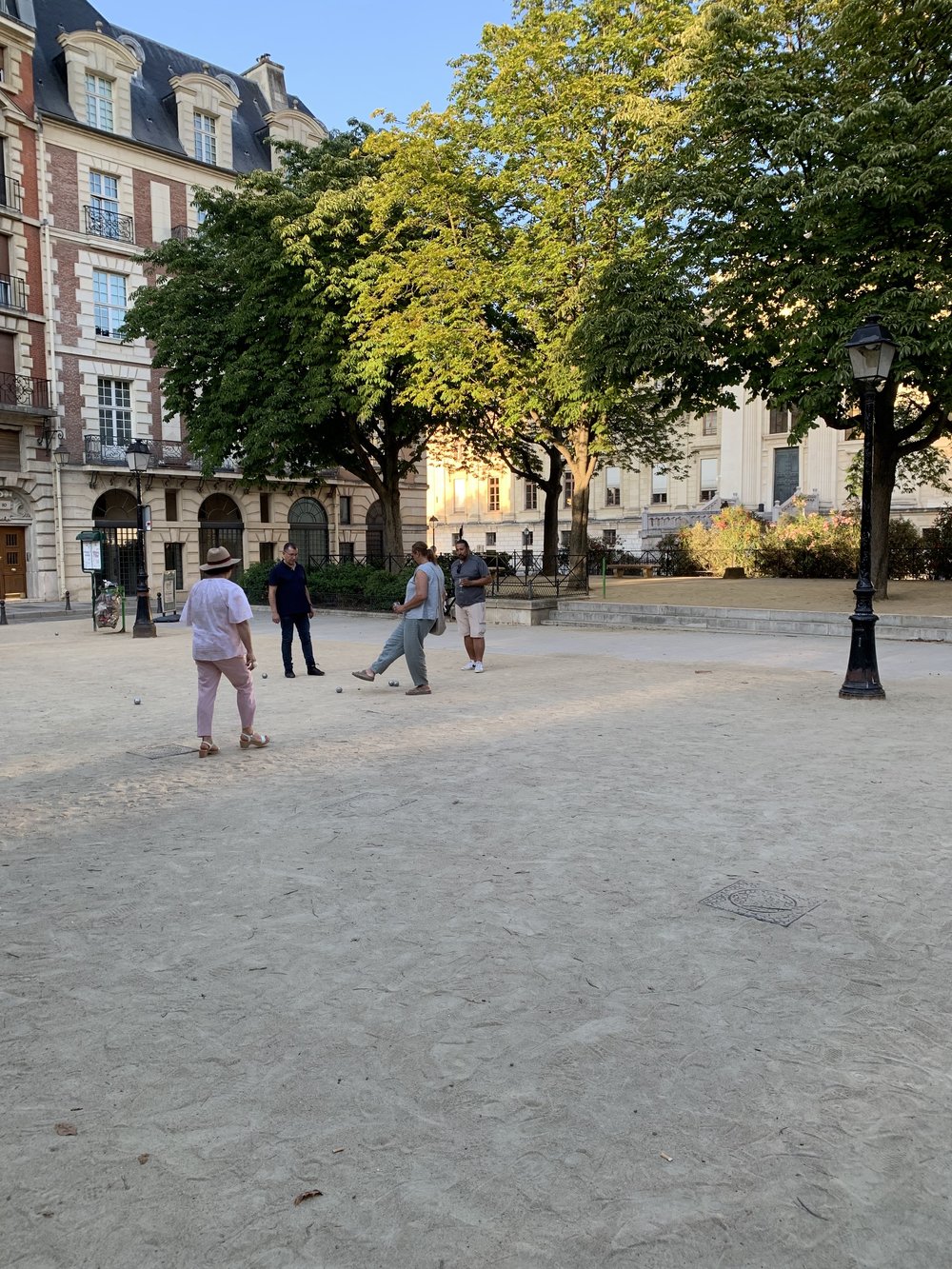 Playing Pétanque at Place Dauphine.jpg