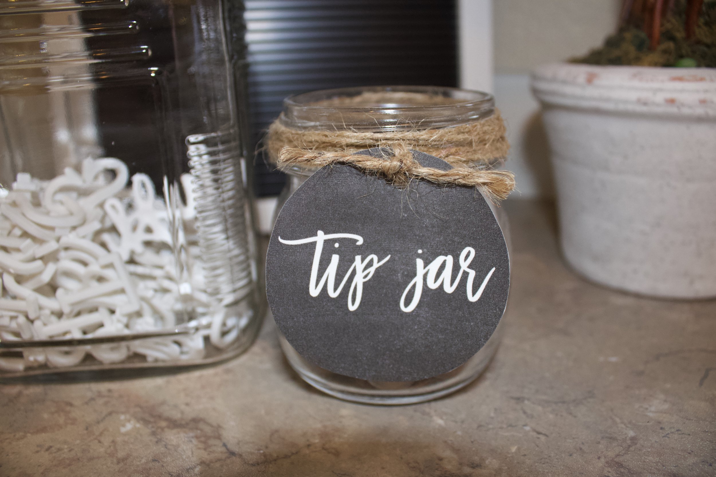 Tip jar for loose change found in pockets.