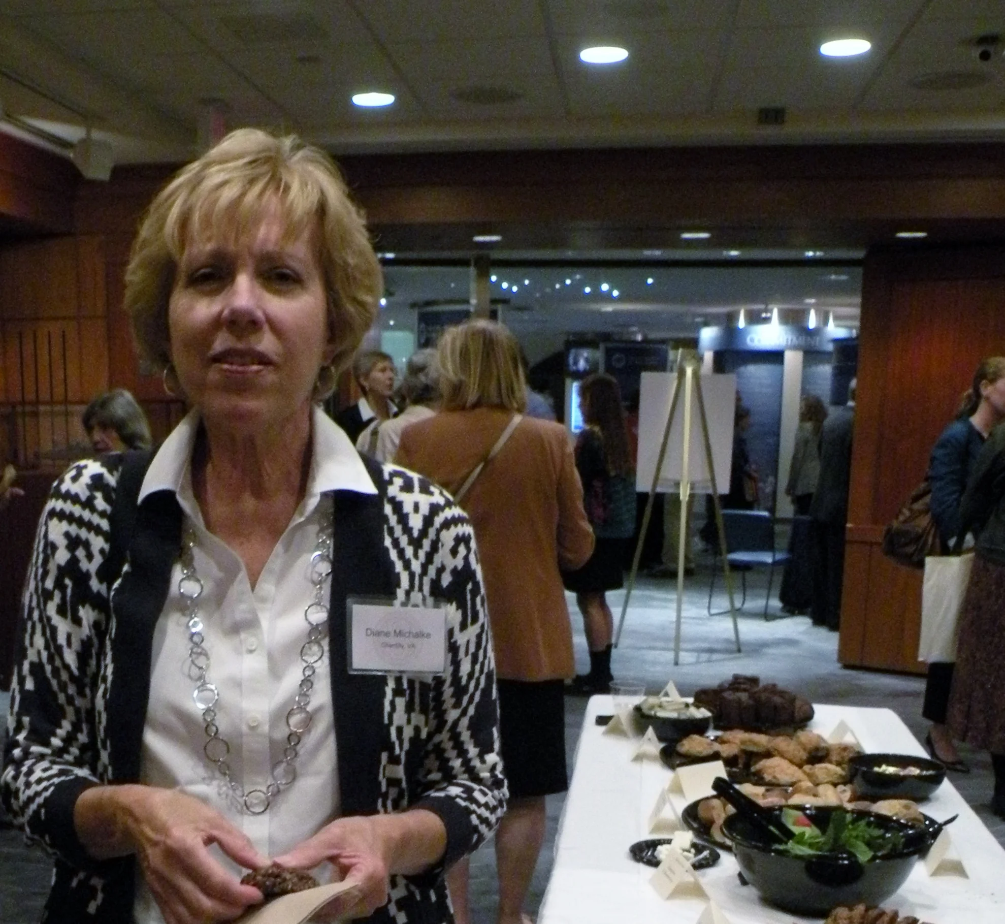 Diane and food table.JPG