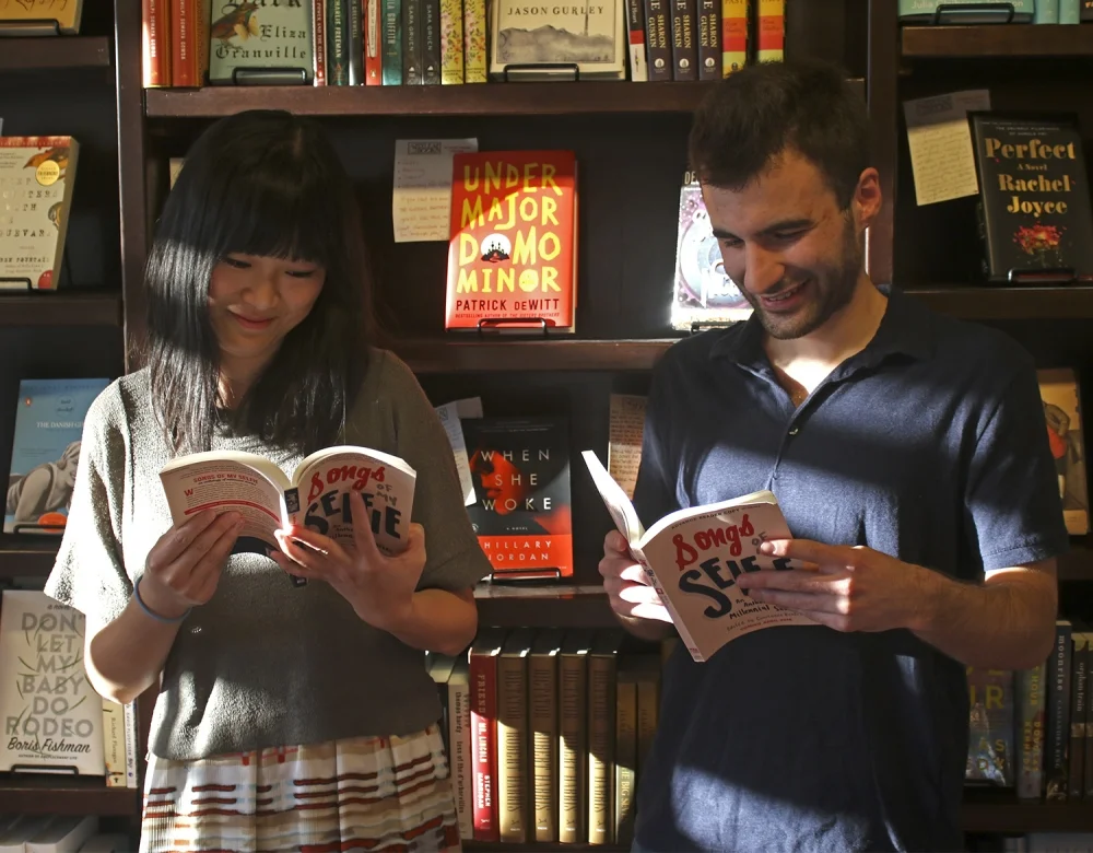 Songs of My Selfie contributors Xingyue Sarah He and Jared Shaffer reading at Flyleaf Books. Photo by Alex Kormann/The Daily Tar Heel.