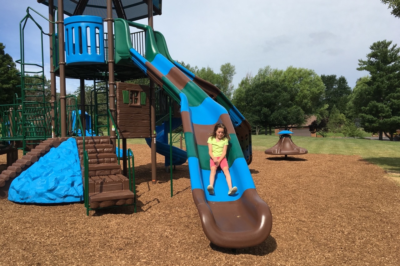 Kaylee Pflieger, nine-year-old daughter of Dan and Melissa Pflieger, was the first child to test out the new playground when it was completed July 14. The family lives near Sunset Beach.