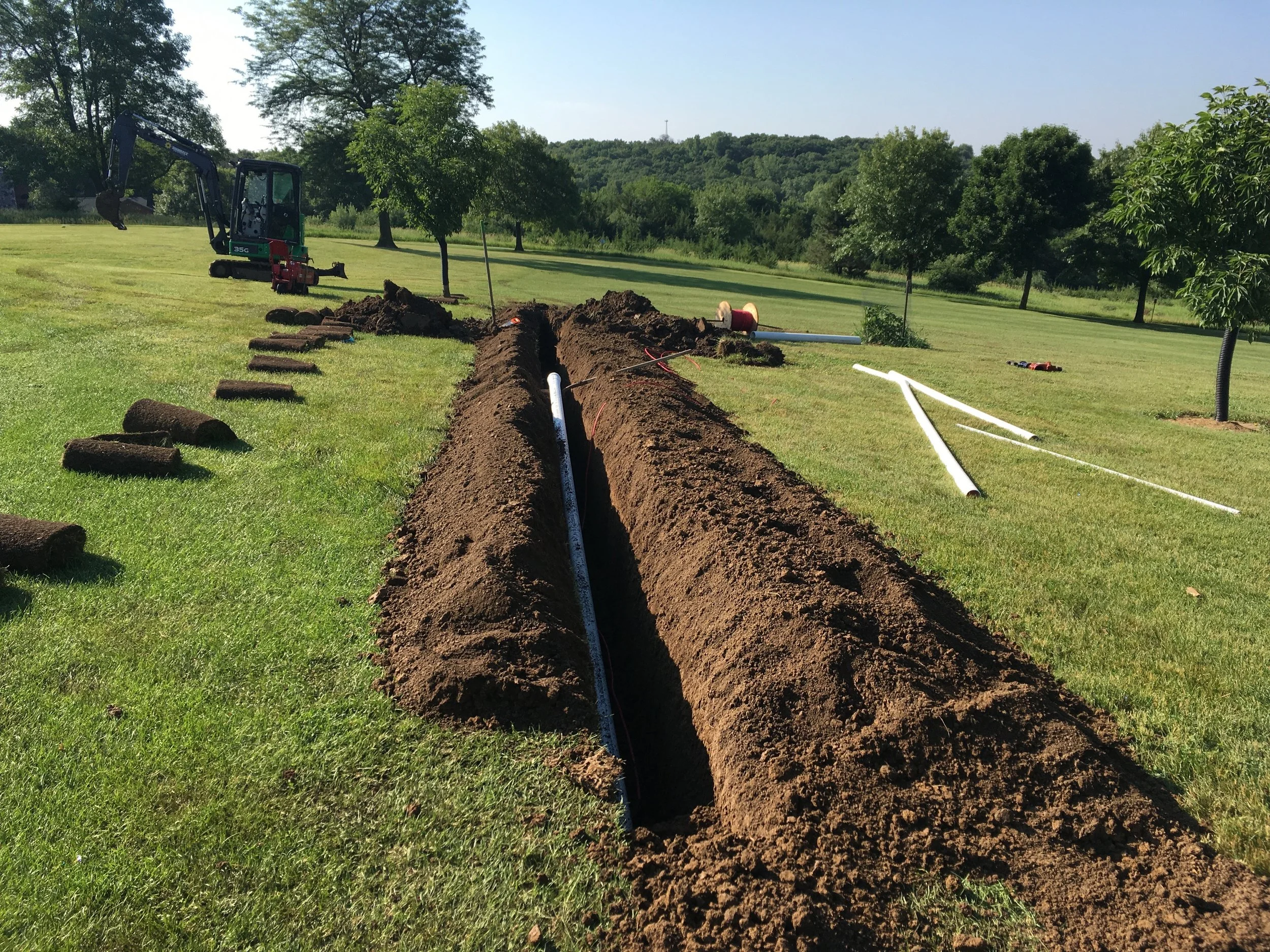 Work on the new irrigation system at Panorama West got underway in late May, and involves trenching in pipe to provide water to all tee boxes, fairways and greens on the golf course.