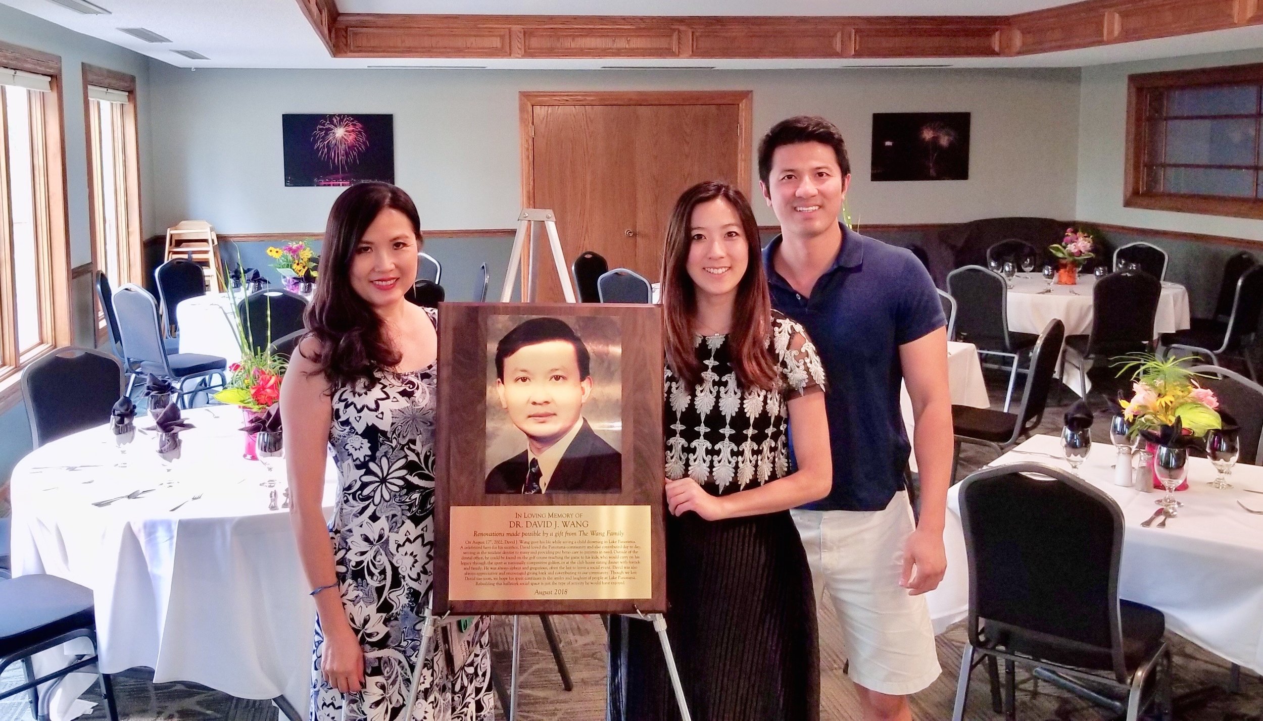  Cassie, Tony and Grace Wang are shown in the LPN dining room with a plaque honoring Dr. David Wang, who passed away in 2002. The Wang family made a donation to Friends of Lake Panorama in his memory, with some of the money used to update the dining 